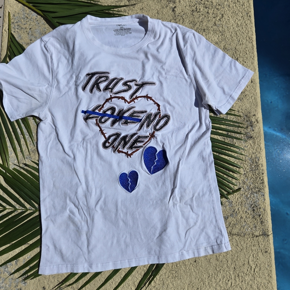 White Graphic Tee with Blue Accents